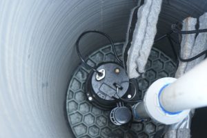 Interior of sump basin showing pump and Hydraway drainage components for advanced water removal.