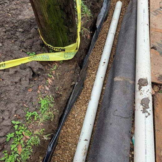 drainage installation with pipes and gravel in dallas, tx