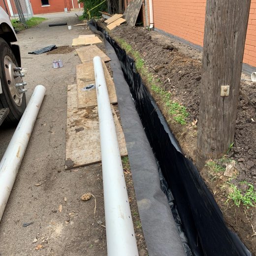 moisture barrier installation in dallas, tx for drainage project